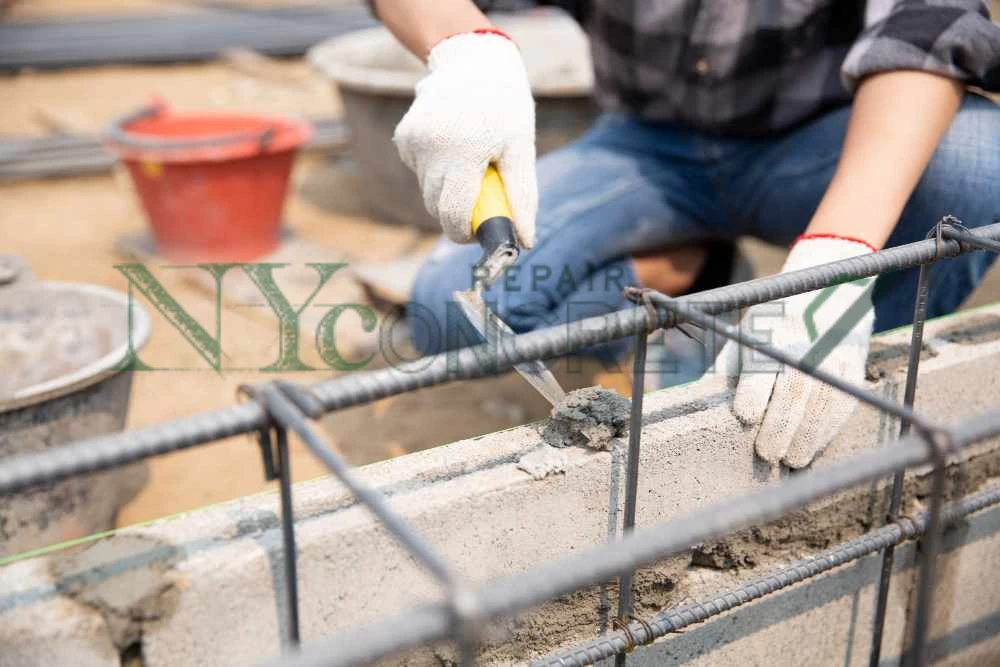 concrete work at the base of a nyc building